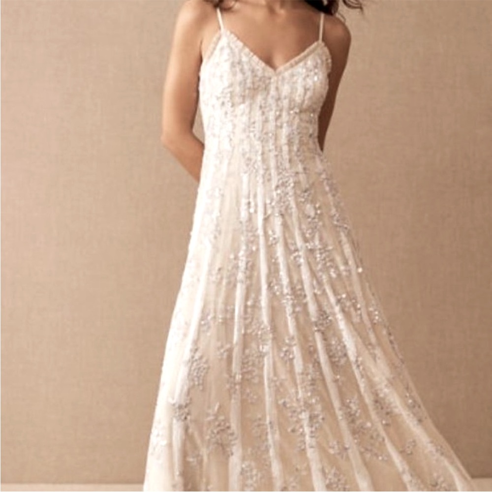 NEEDLE AND THREAD long, sequin gown.